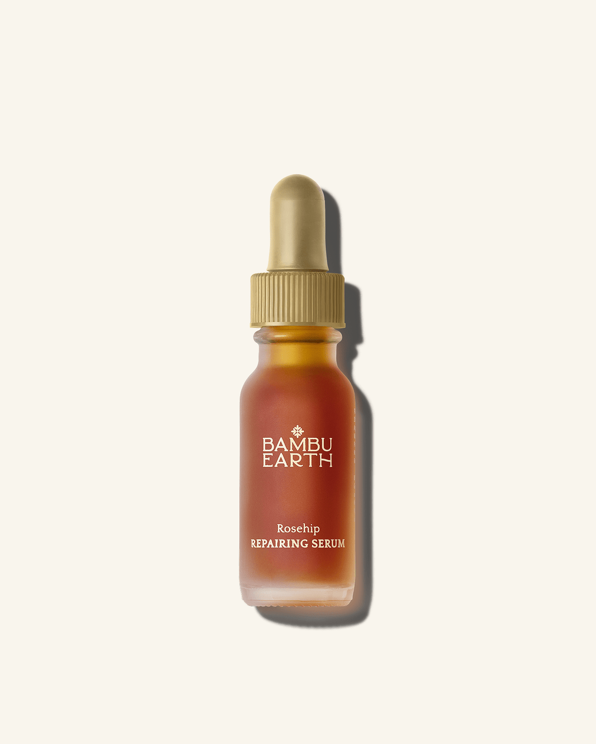 Bambu Earth Rosehip Repairing Facial Serum - Bambo Earth Rosehip Repairing Serum bottle with dropper on a white background